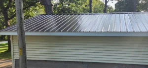 Metal roofing over shingles install in Wisconsin