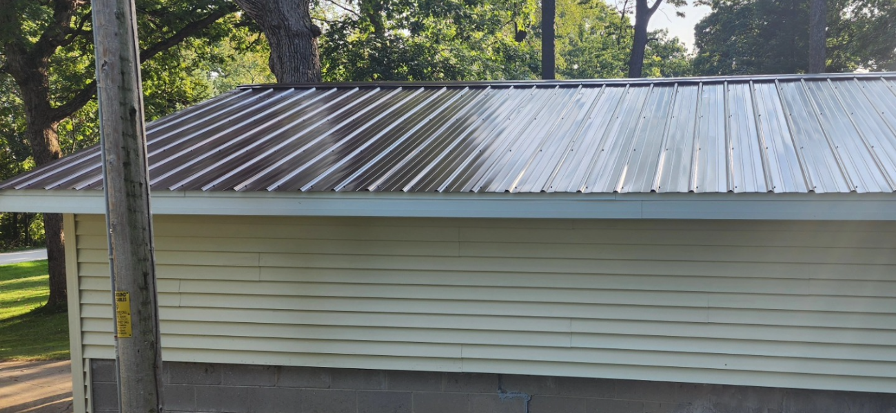 Metal roofing over shingles install in Wisconsin